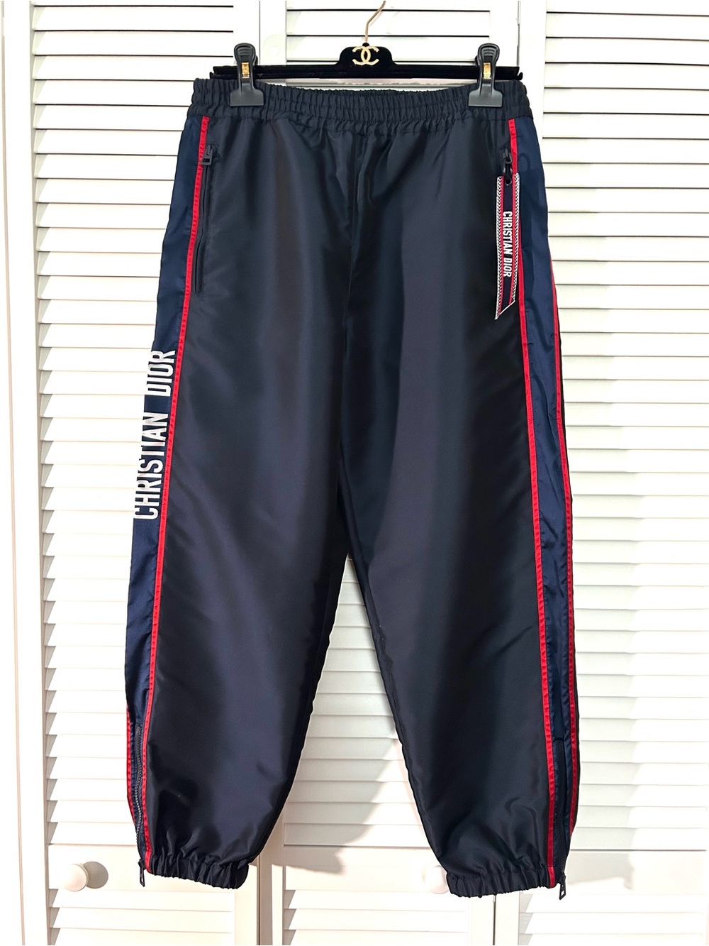 Dior navy pants with red trim and white logo